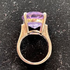 Elegant sterling ring. Large purple solitaire stone.